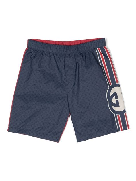 children's gucci swimwear|Children's Interlocking G swim shorts in blue .